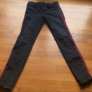 Black Jeggings With Red Stitching Down the Sides